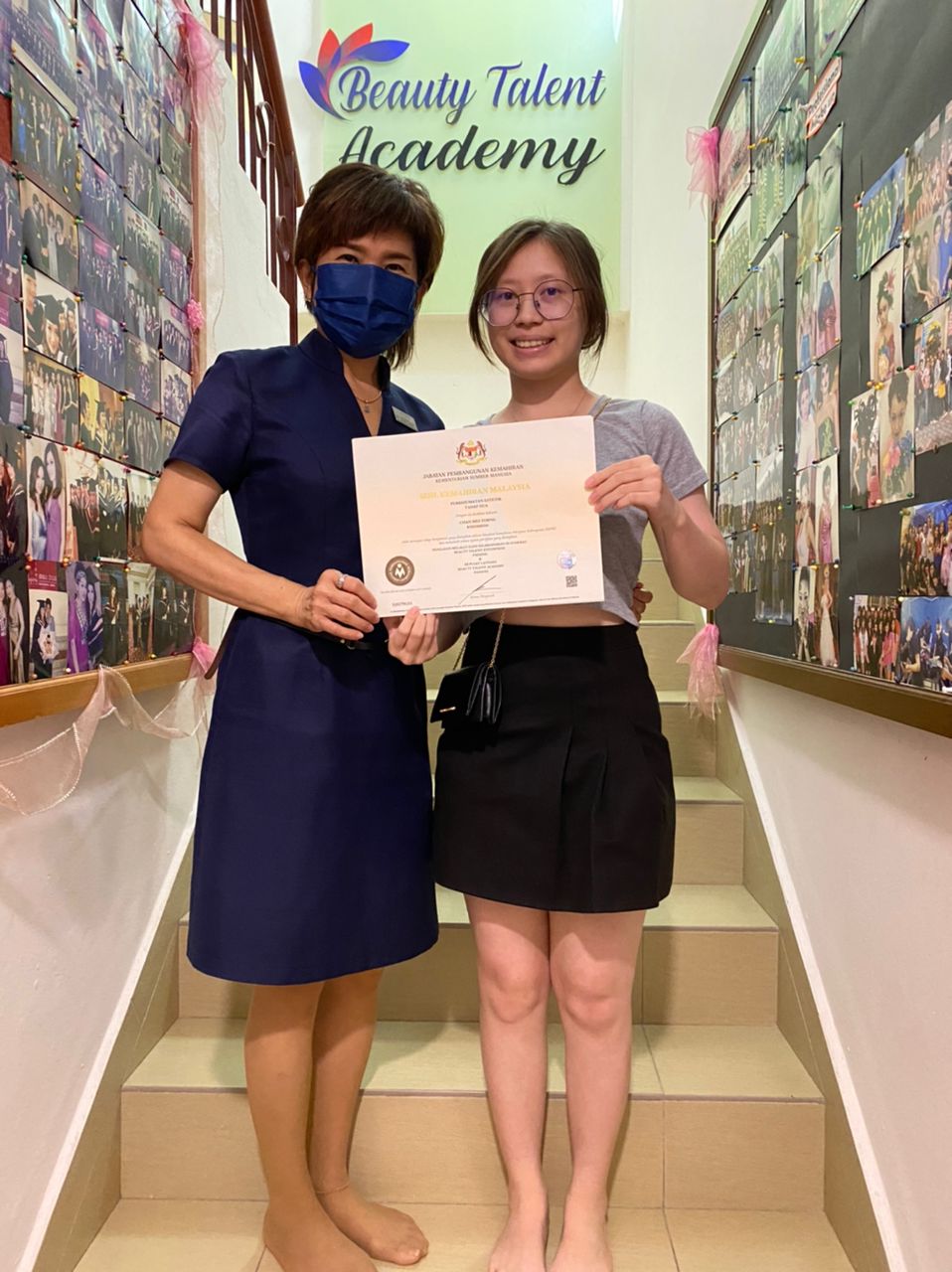 Beauty Talent Academy graduates receiving their certificates
